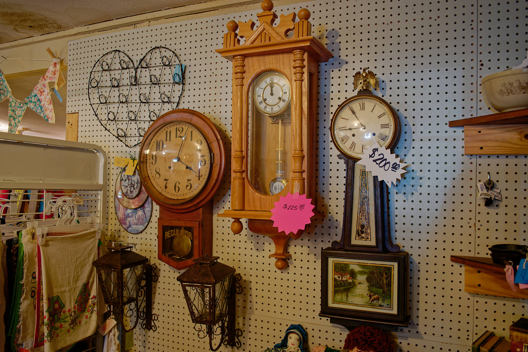 The vintage shoppe Amish wall clocks.
